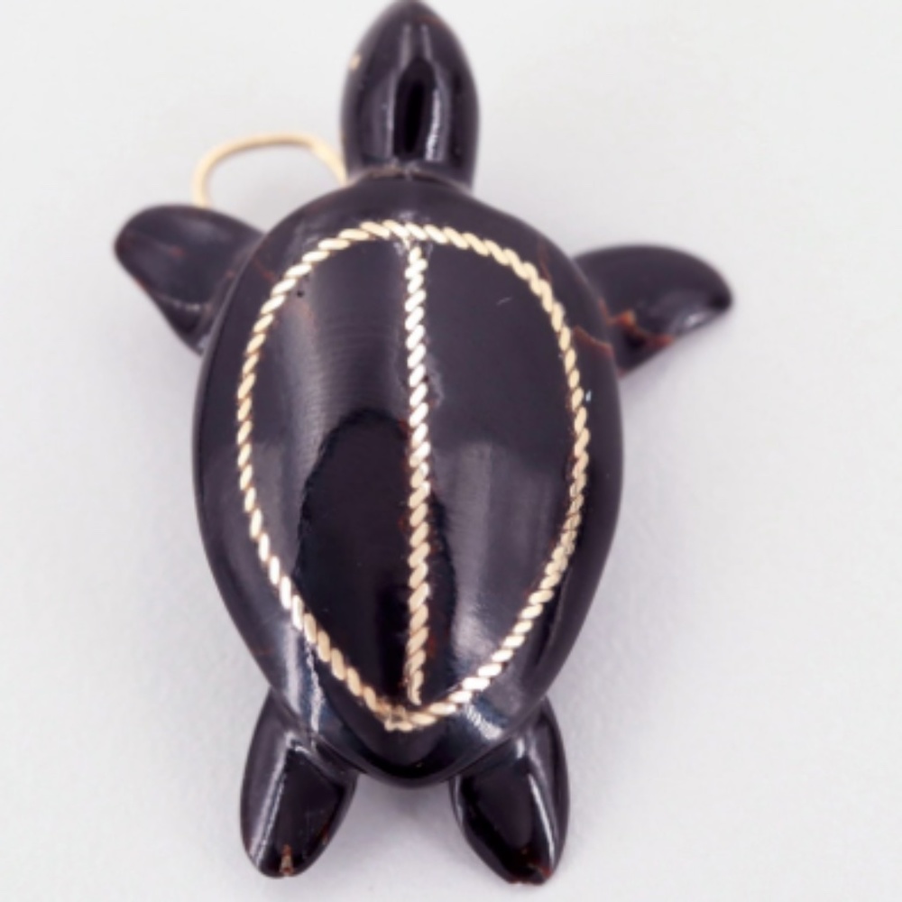 NOT FOR SALE!!!  Looking for this Turtle Pendant!